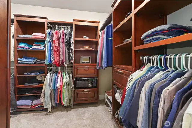 Walk-in primary closet offers plenty of space.