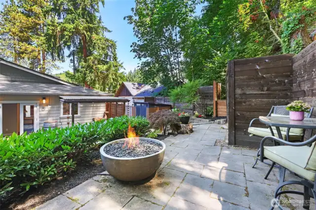 Several different areas to hang out in the backyard area.