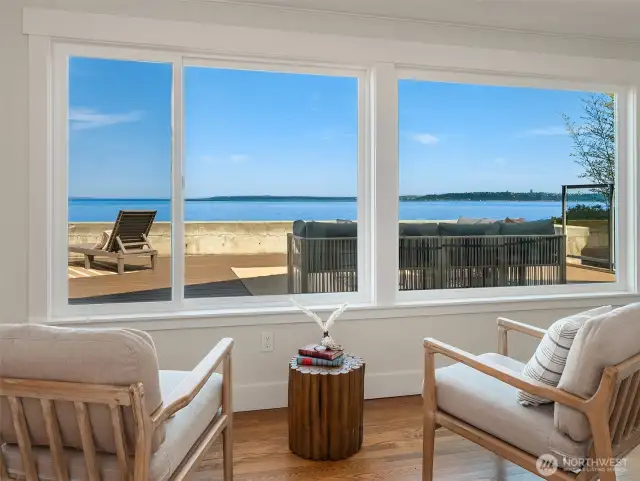 A comfortable space that could be used for a living room, dining room, or maybe close it in for a 3rd bedroom.