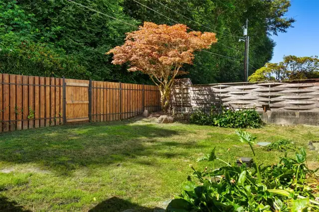 A fenced yard will welcome your pets to play.