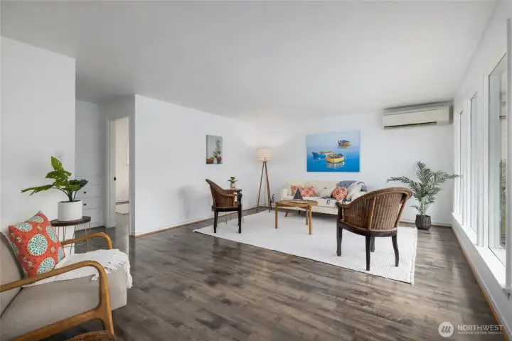 The bright and spacious living room is so inviting.