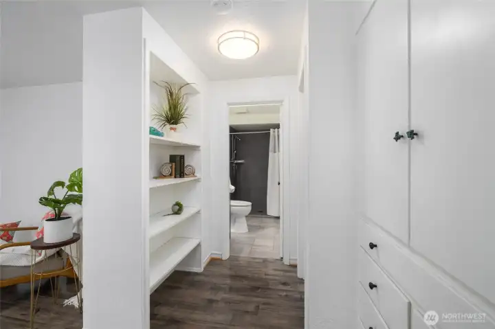 The hallway between the bedrooms has great built in cabinets.