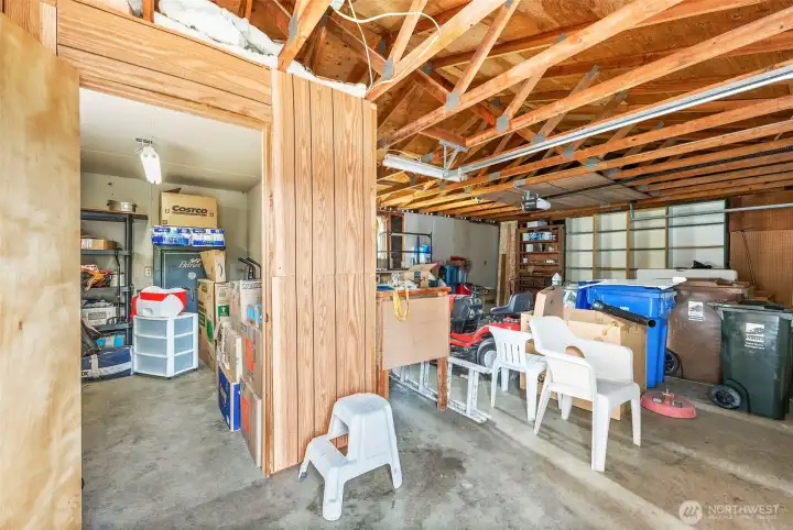 Extra office/storage area in 2-car garage with shop table which stays