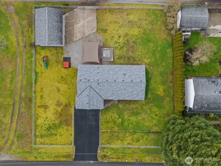 Aerial view showing brand new roof installed in 12/2025