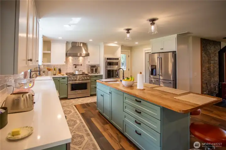 Custom butcher block island with prep sink