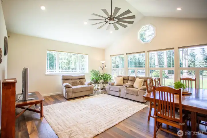 Large dining room/ living room with the perfect amount of natural light