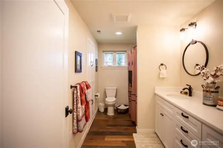 Main bathroom with built in storage and double sinks