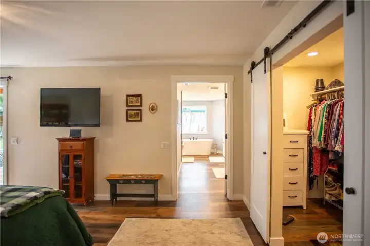 Primary bedroom with walk in closet and 5 piece ensuite