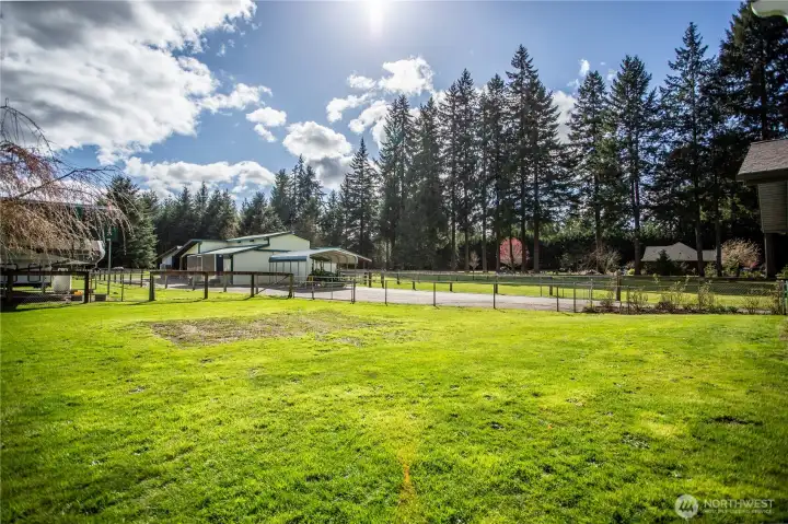 3 stall barn with covered parking area