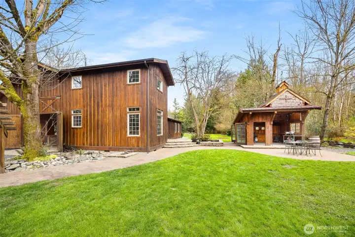 Front entry to backyard patio, burn pit and entertaining gazebo
