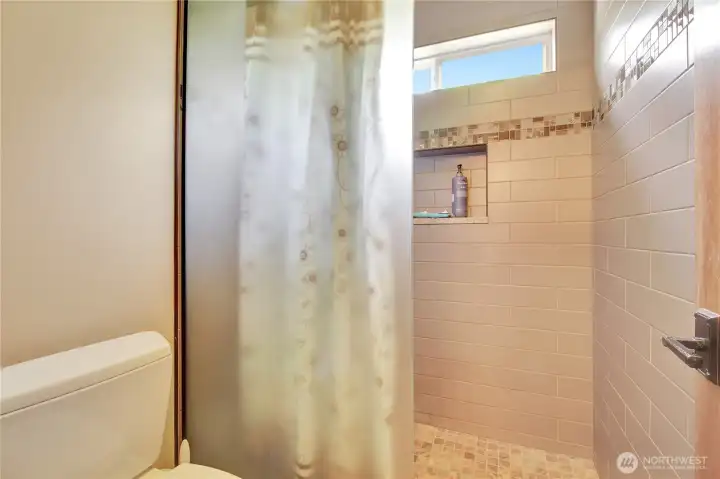 Walk in shower in Jack and Jill bath. . .