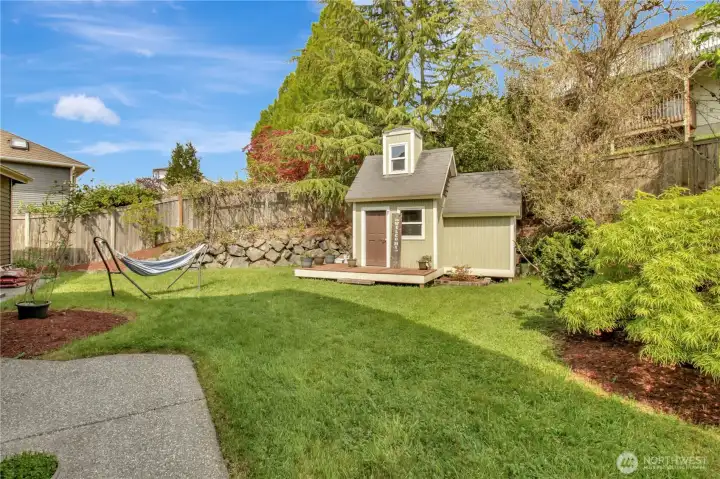 Playhouse in private backyard. . .