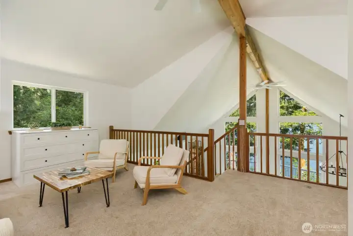 Primary suite has tall ceilings and updated ensuite bathroom with double vanity, bath tub and deep linen closet.