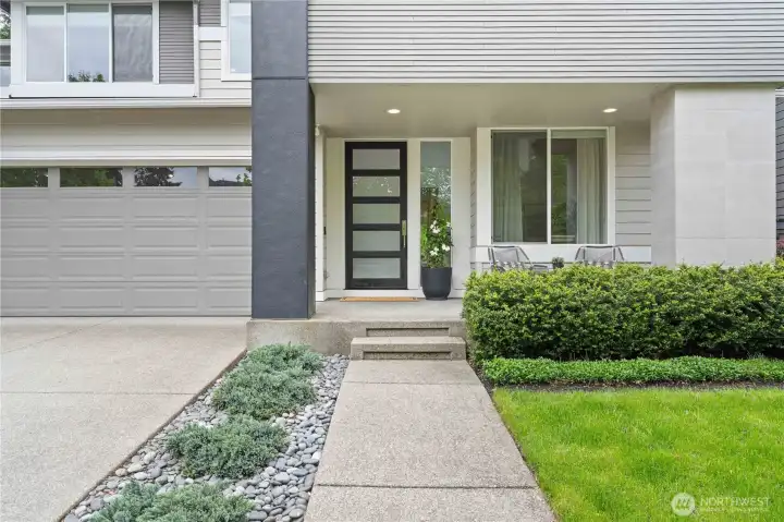 Front porch, with a grand door.