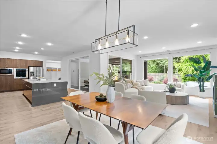 Dining space overlooking the living room, perfect for entertaining. With lots of natural light