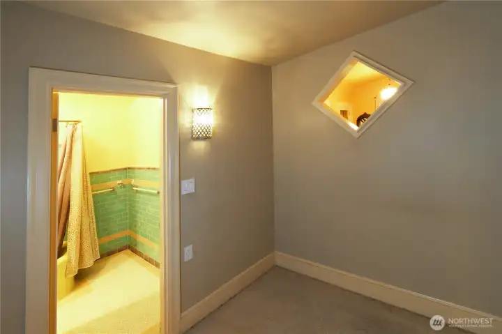 Cool cut away in the wall looks through to the dining room.