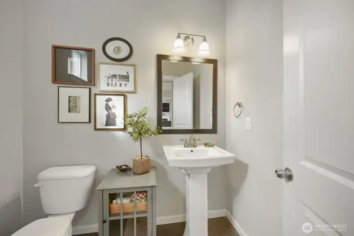 Elegant powder room with stylish finishes.