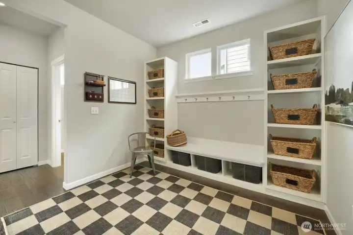 Custom mudroom with smart built-in storage.
