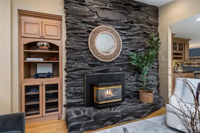 Beautiful stone fireplace and gorgeous built-in.
