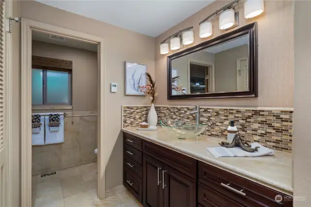 Fully remodeled primary bathroom with heated floors.