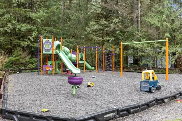 Multiple playgrounds and park areas throughout.