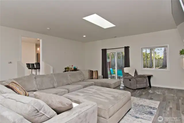 spacious family room w slider to backyard