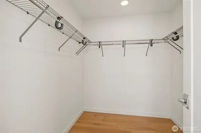 Primary bedroom walk-in closet.