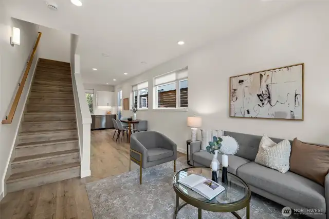 Coming through the front door to a great room concept with engineered hardwood floors.