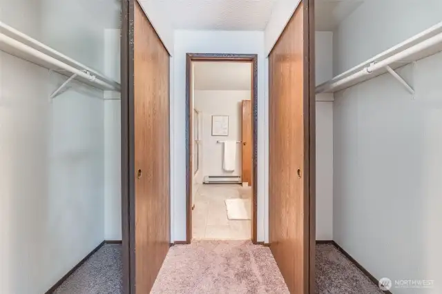 These dual closets are located between the primary bedroom and the second floor bathroom.