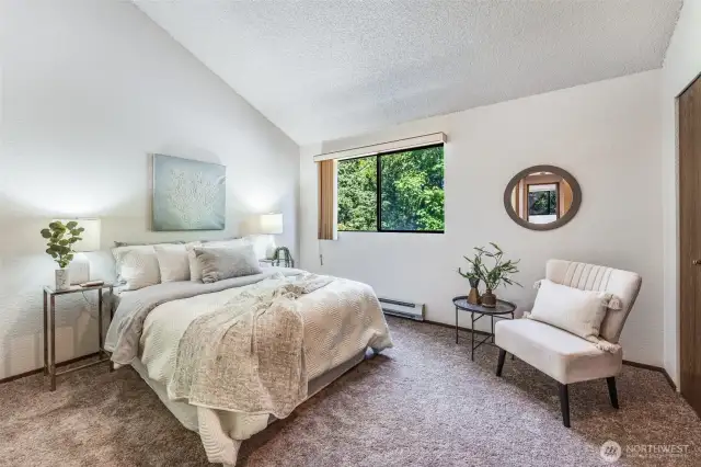 The upstairs also has a second bedroom with vaulted ceilings.