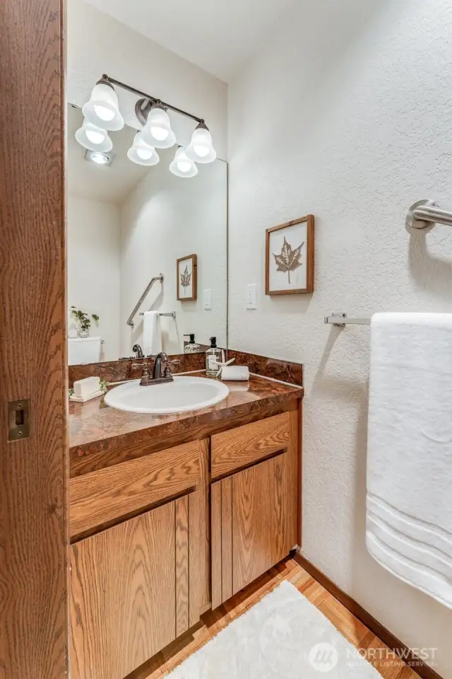 Back down on the first floor is the charming powder room.