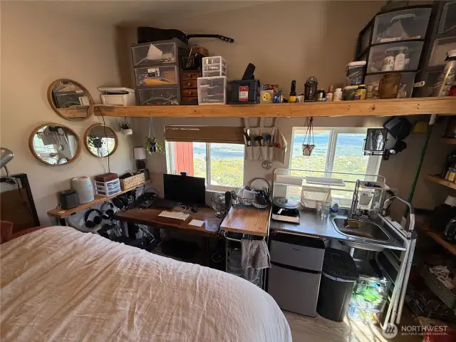 Cozy, but fully functional with kitchenette and appliances.