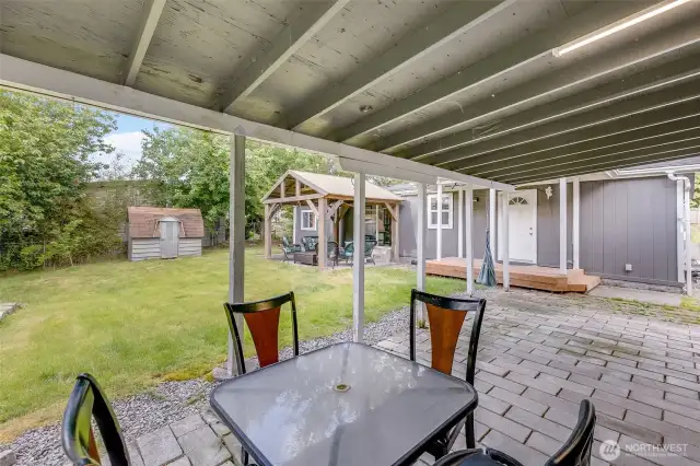 Overhang additional area adjacent to detached structure