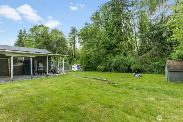 Yard extends to tree line