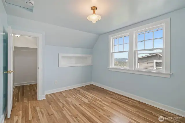 Upstairs Bedroom with Spacious Walk-in Closet and Built-ins