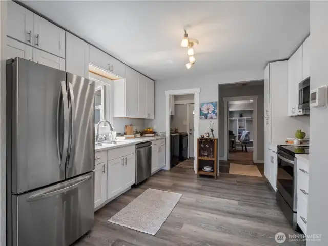 This kitchen has room for a small table or roll-away island if you desire to have a second eating space.