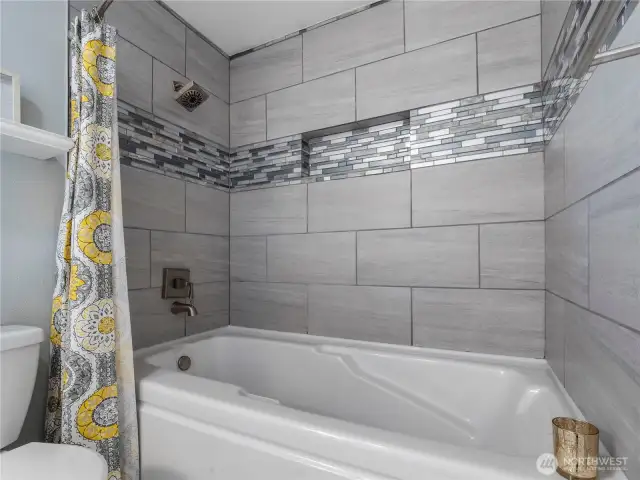 Soak in the tub or take a nice shower, whatever your fancy; this bathroom will accommodate.