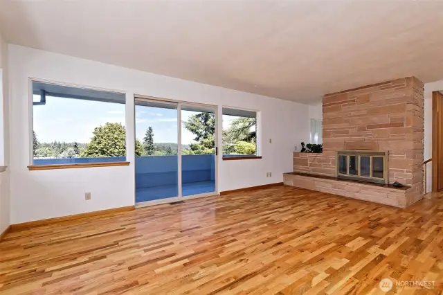 Spacious living room with real, beautiful hardwood floors!