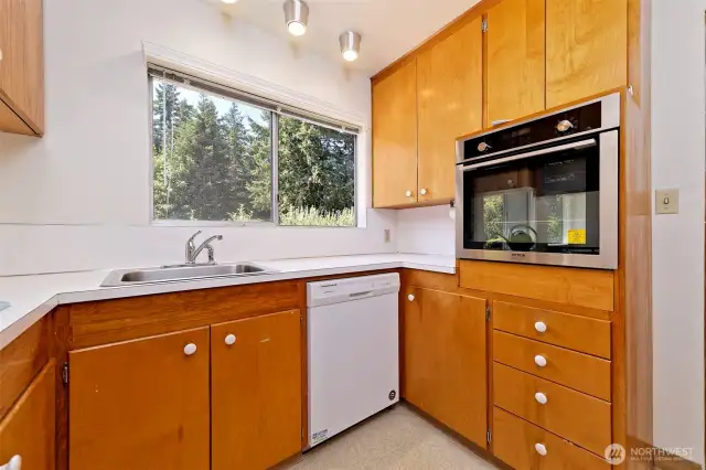 Kitchen with brand new wall oven.