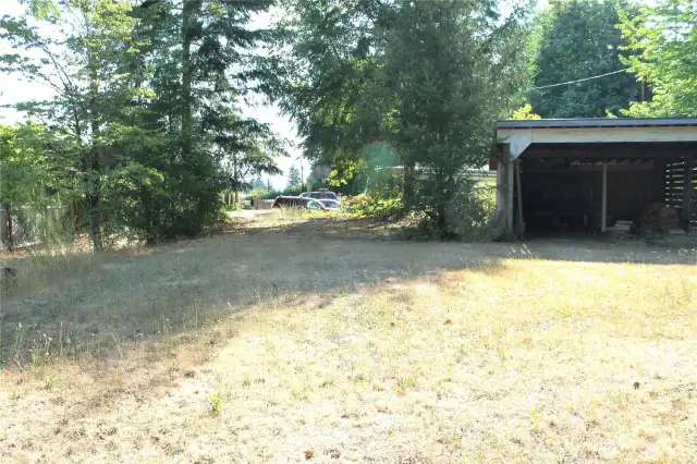 Adjacent lot in the back yard alley.