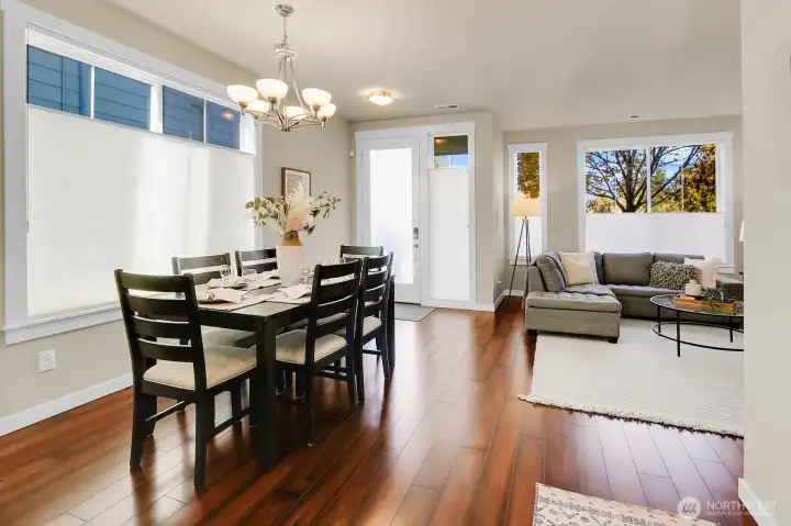 Room for a nicely sized dining table for your gatherings, plus counter seating in the kitchen.