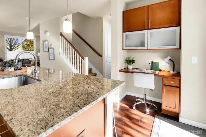 Just off the kitchen is your command center. Just to the right of this photo is the backyard, garage, and extra parking space.