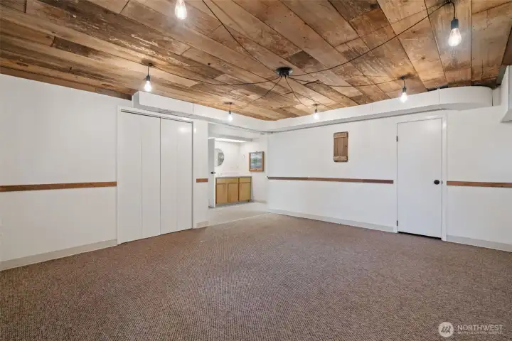 lower level family room with wood ceiling