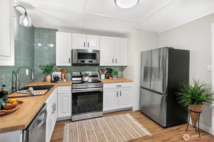 All new stainless steel appliance package.