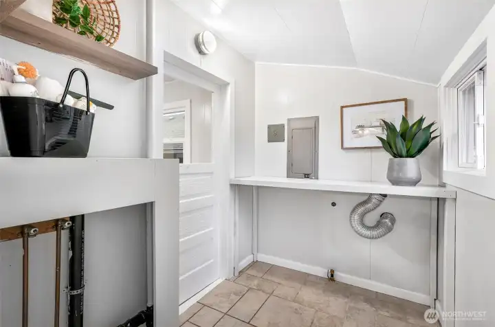 Laundry room right off the kitchen.