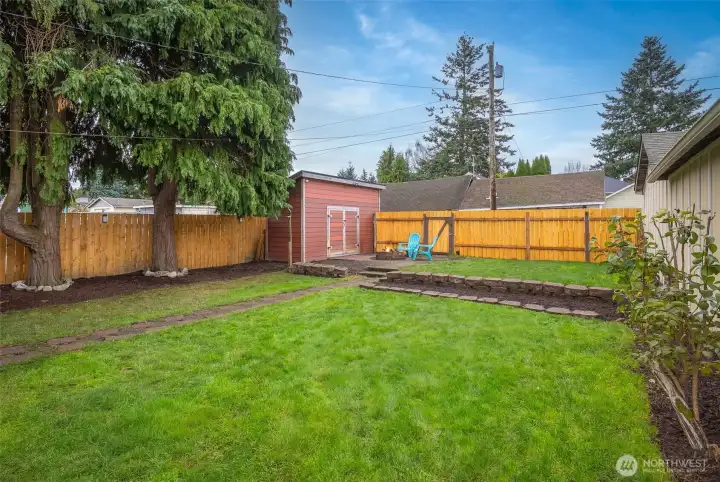 Fully fenced backyard, perfect for hosting.