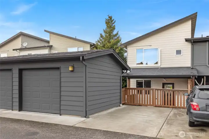 Secure garage and deeded parking space adjacent.