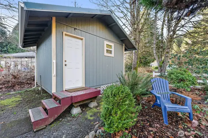 New Shed that is fully insulated and ready to use. Currently being used for and Arts/Crafts Station!