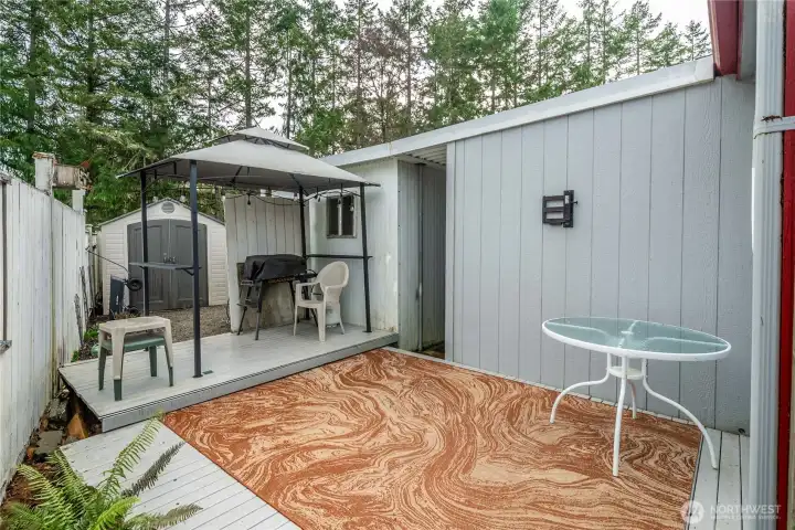 Private patio creates a quiet spot for outdoor seating and relaxed Pacific Northwest living.