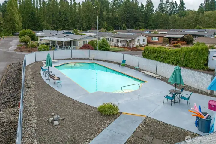 Outdoor heated pool offers a refreshing place to relax and socialize during the summer months.